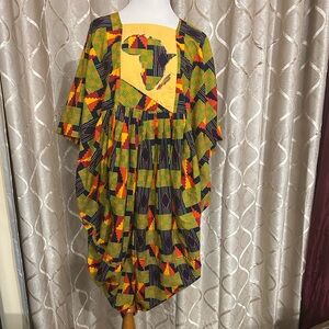 Hand made printed African caftan style dress. Can fit a size medium to Large.